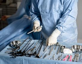 woman in surgical gown and equipment